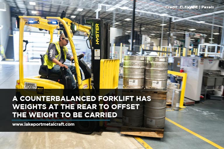 A counterbalanced forklift has weights at the rear to offset the weight to be carried
